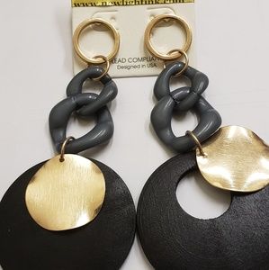 Earrings by: New light ink apparel and accessories